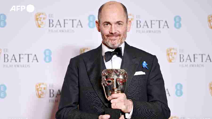 Edward Berger with his Best Director gong for All Quiet on the Western Front, which won a total of seven BAFTAs