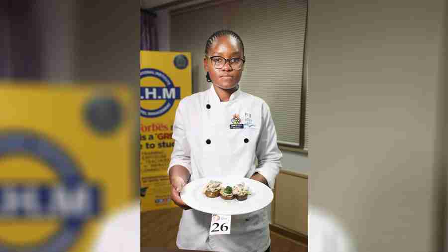 Boago Amantle David from Botswana, a group C participant, with the dish she presented at Dr. Bose Challenge. 