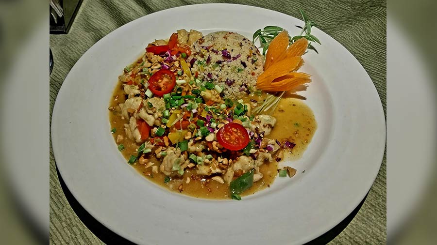 Chicken Peanut Curry with wok-tossed Millet 