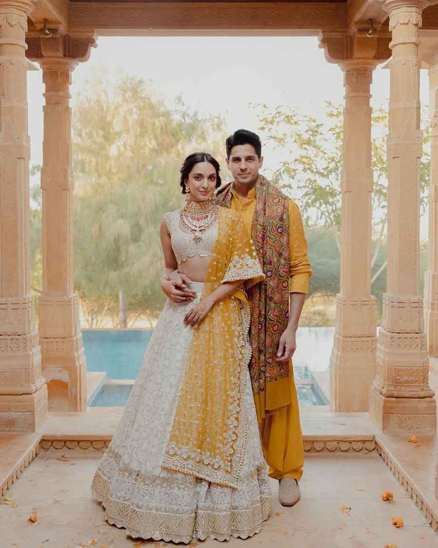 Kiara opted for an off-white chikankari lehenga with a pearl-beaded blouse, golden yellow dupatta and colourful jewellery.