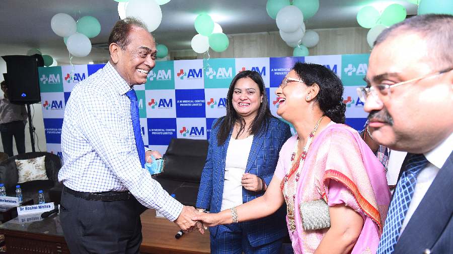 Eminent gynaecologist Dr Pronab Dasgupta (left) in a meet-and-greet session with guests and former patients after the panel discussion.