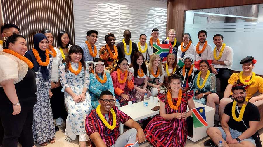 Participants from various countries pose for group photo