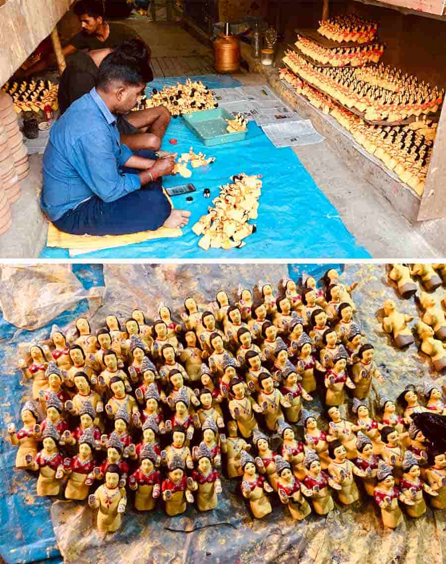 Artists lend finishing touches to Gangaur idols which will be used for Ganguar Puja which begins after Holi
