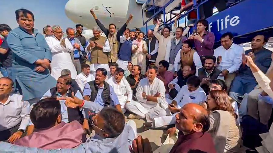 As drama escalated at terminal one of the domestic airport here, flight staff told Congress leaders there was confusion with Khera's bags. They said police was on its way and would explain the reason to him.  Several Congress leaders raised slogans against the government while on the tarmac.