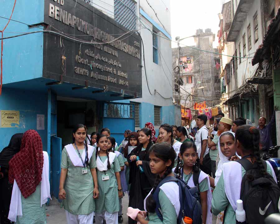Students crowd the entrance of Benia Pukur High Madrasah to appear for the High Madrasah Examination 2023 on Thursday