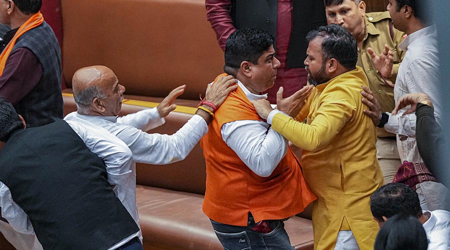 Councillors of AAP and BJP clash during the election of members of the MCD Standing Committee, at the Civic Centre in New Delhi.