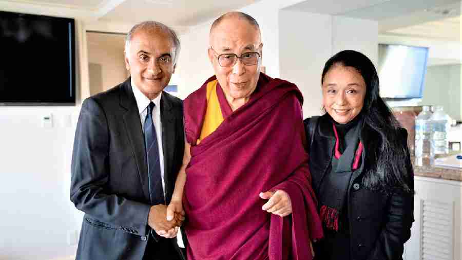 Pico Iyer and his wife Hiroko with the Dalai Lama. 