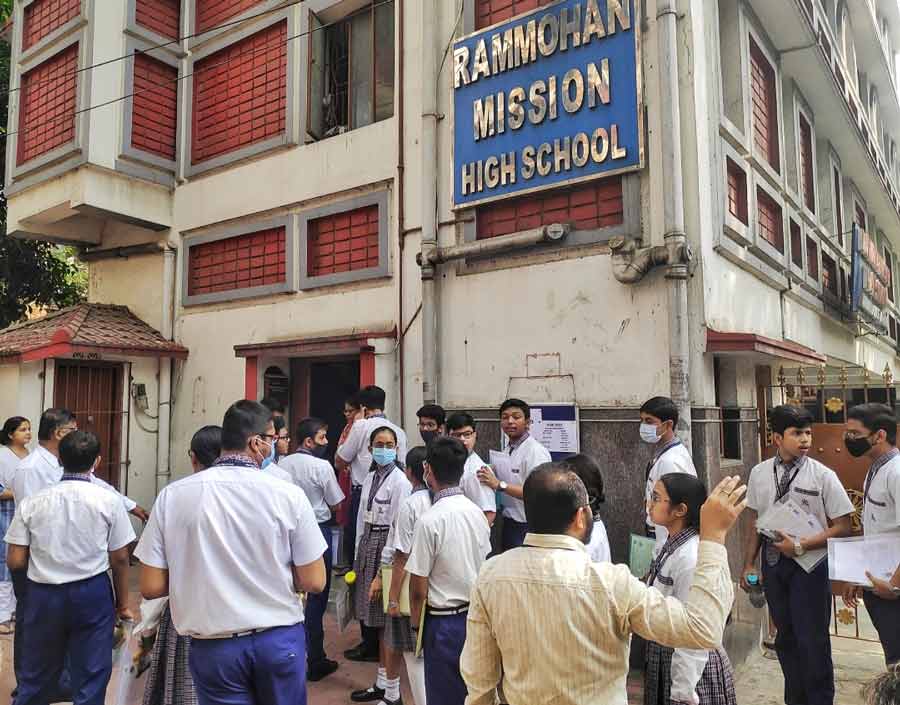 Students get ready to enter Rammohan Mission High School on the first day of ICSE examinations on Monday