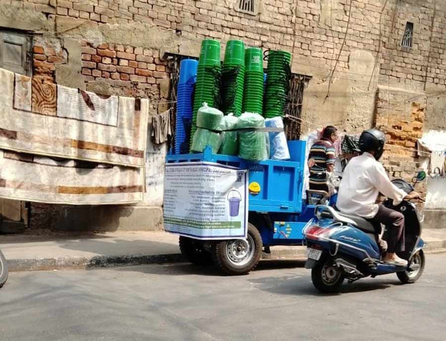 Dustbins to segregate biodegradable & non-biodegradable waste in transit on Tuesday. The Kolkata Municipal Corporation has taken an initiative to make people aware of the need to segregate waste at source. As a part of this initiative, the KMC is handing out a green dustbin for biodegradable waste and a blue bin for non-biodegradable waste to every household