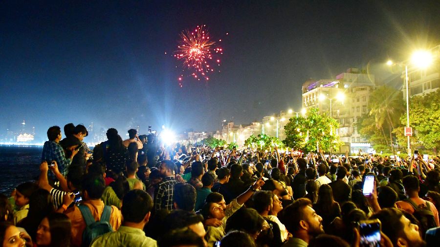  Citizens gather at the Marine Drive to celebrate the New Year, in Mumbai. 