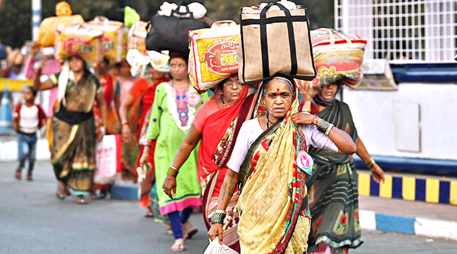 Pilgrims from Maharashtra in Calcutta last week, en route to the Gangasagar Mela venue.
