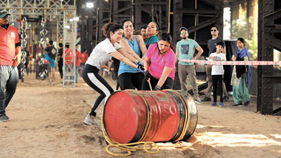 Sand-out: A test of strength and teamwork, a sand-filled barrel was pulled to and fro for success in this round.