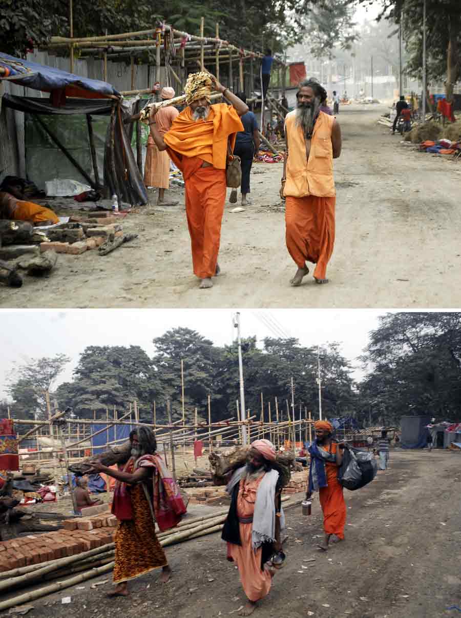 Gangasagar-bound sadhus arrive with their belongings at a  transit camp at Babughat on Tuesday