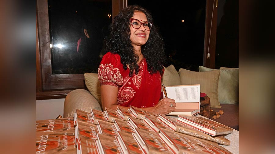 Nandana signing copies of her book after the session