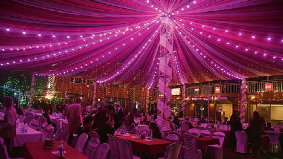 The illuminated club premises decked up in red and white