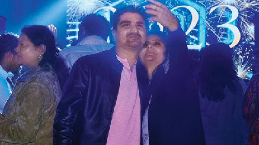 This couple posed for a selfie to make the moment memorable while the crowd behind them went wild with joy as the clock struck the midnight hour to usher in the New Year.