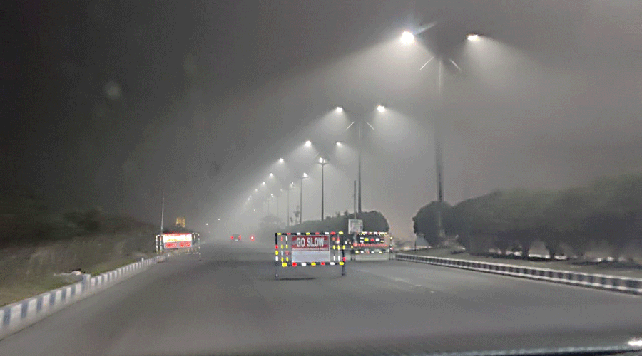 Guardrails amid fog on Wednesday night on a road in New Town that leads to housing complexes like Elita Garden Vista in Action Area III from the Unitech intersection.