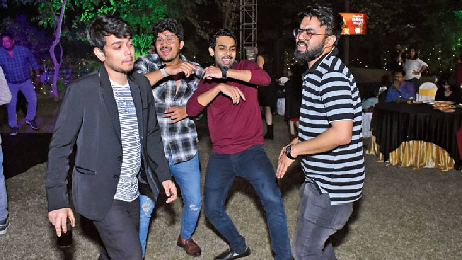 As the clock struck midnight, (l-r) Rohan Ghosh, Souvik Banerjee, Surojit Das and Pathikrit Roy couldn’t resist making it big and desi on the dance floor.