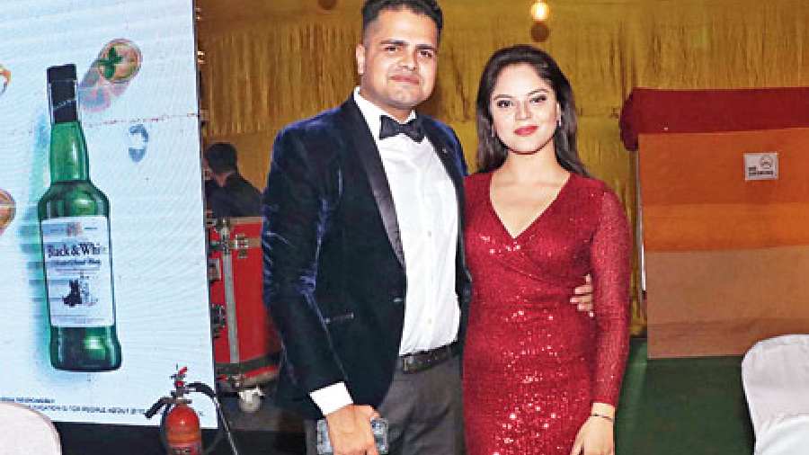 Red and black are classic party colours and couple Shivam and Nalini Pandey rocked in it