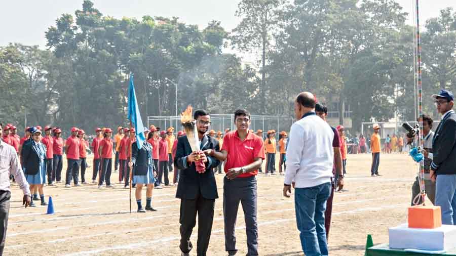 The torch being brought to the chief guest