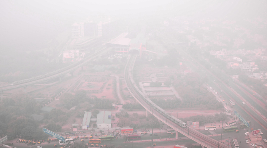 Noida Sector 37 covered by winter morning fog in Noida.