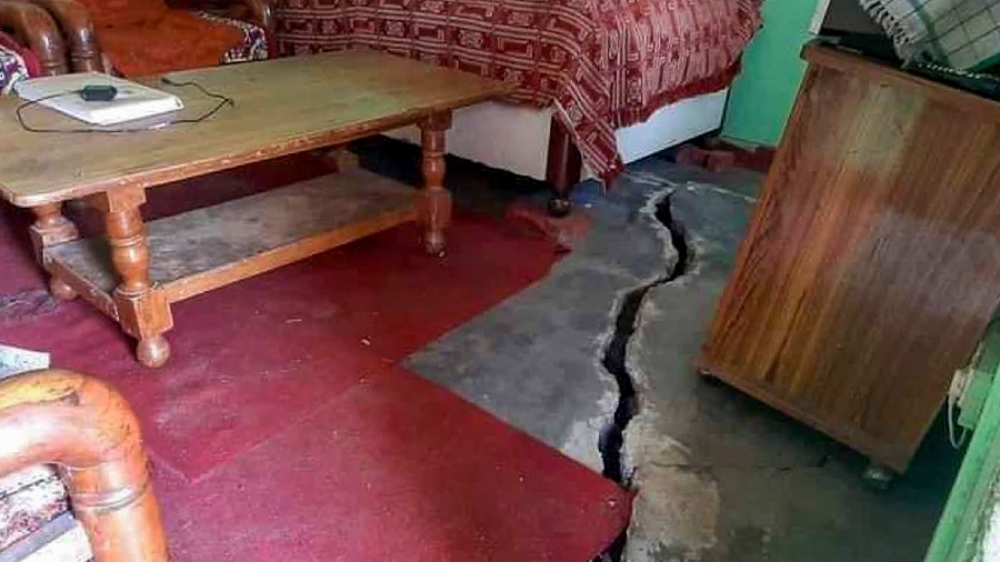 Crack appears at a house due to landslides at Joshimath in Chamoli district of Uttarakhand. 