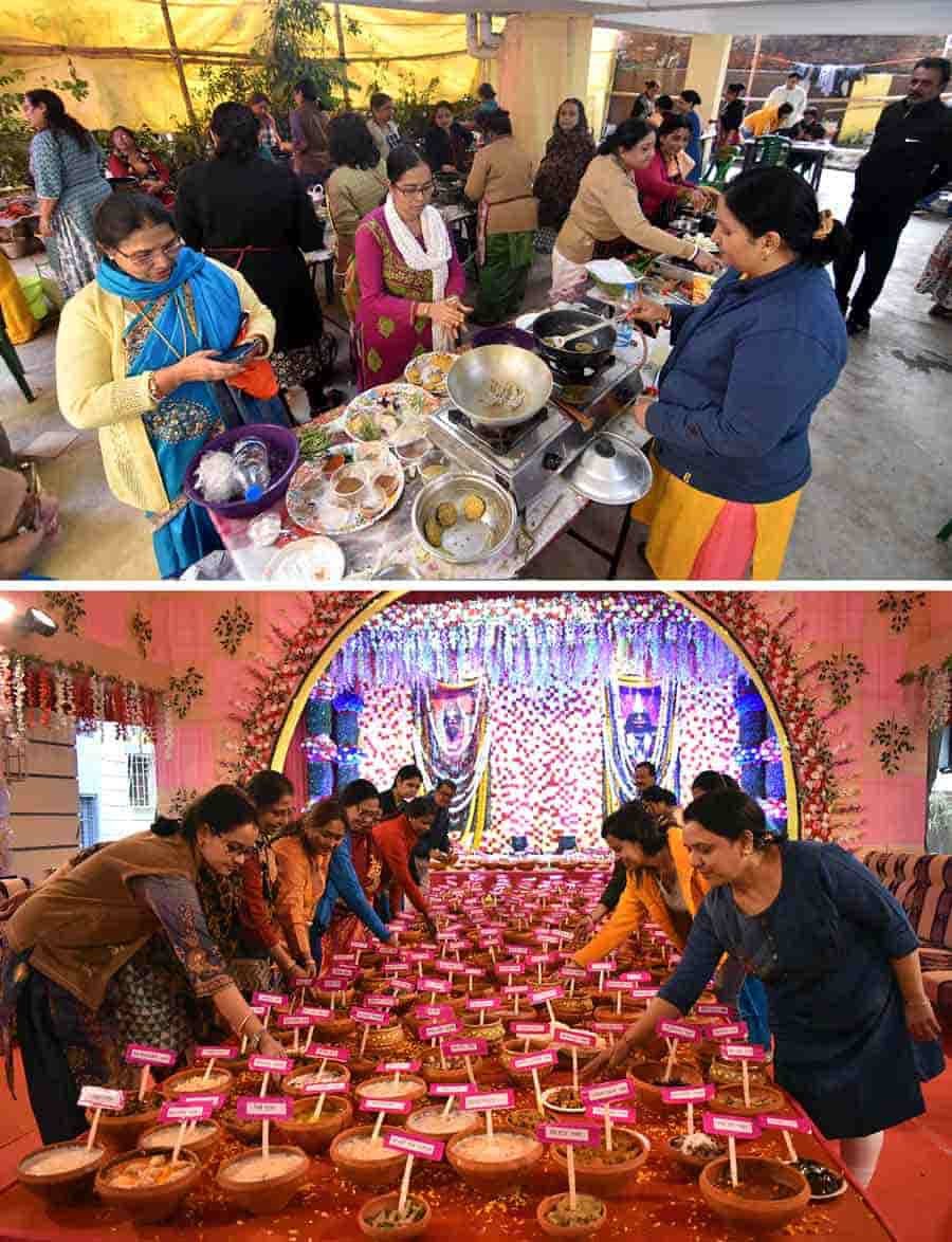 Devotees prepare and offer 451 types of ‘bhog’ at a Kali Puja in  Bagbazar, north Kolkata on January 7, Saturday