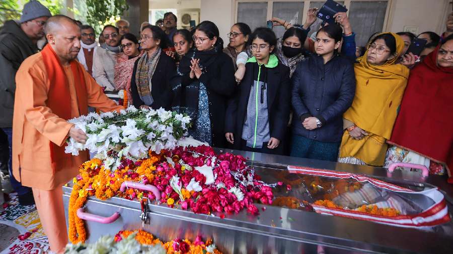 Uttar Pradesh Chief Minister Yogi Adityanath pays floral tribute to former West Bengal governor Keshari Nath Tripathi, who passed away this morning, in Prayagraj, Sunday, January 8, 2023.