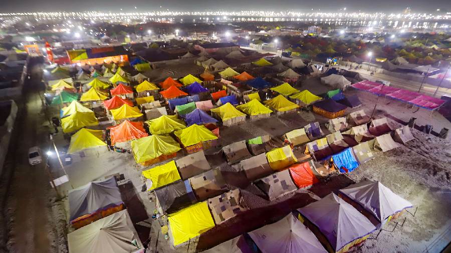  A view of tents which are installed for pilgrims ahead of the month-long annual fair Magh Mela at Sangam, in Prayagraj, Saturday evening, January 7, 2023. 