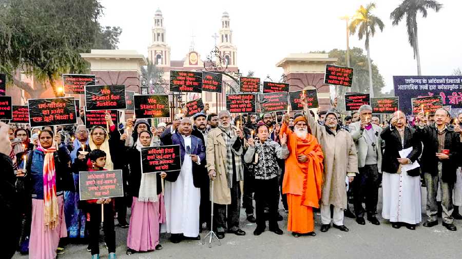 A candlelight vigil at the Sacred Heart Cathedral Catholic Church in New Delhi on Sunday against the alleged attack on Christian Adivasis in Chhattisgarh