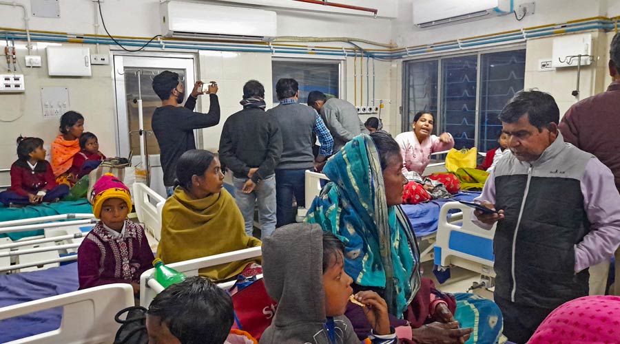 Students get treatment at Rampurhat Medial College and Hospital after they reportedly consumed mid-day meal in which a snake was found at Mondalpur Primary School, in Birbhum.