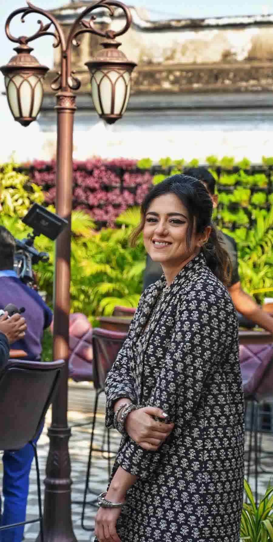 For the song launch, Riddhi Dogra donned a black outfit with white print and a silver choker necklace. 