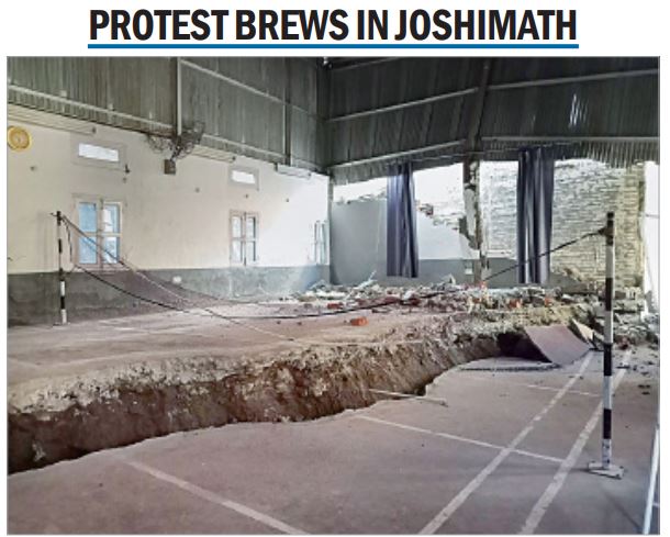 A fissure runs through an indoor badminton court at Joshimath in Uttarakhand. The town has been declared a disaster-prone area after large cracks appeared in homes and on roads. Over a thousand people converged at the Joshimath-Badrinath Highway on Tuesday evening, chanting slogans against the BJP government and demanding compensation and a detailed rehabilitation plan before their damaged houses were demolished. The residents said they would not let the government bring down the buildings before their demands were met.