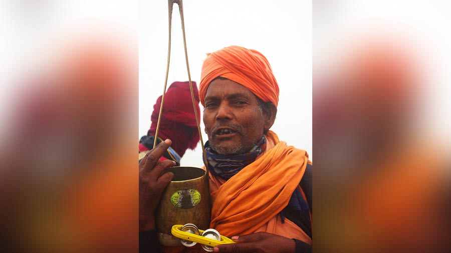 A baul singing with an ektara at Joydev Kenduli fair ground