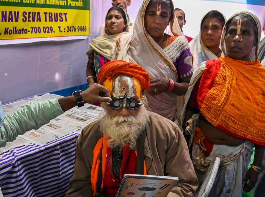 A Gangasagar pilgrim at a free eye-testing camp at Outram Ghat, Kolkata, on Wednesday