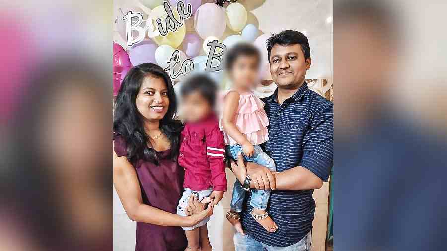 Undated picture shows Tejaswini and her son Vihan, who were killed in the pillar crash, and her husband Lohith Sulakhe and daughter Vismita, who escaped with injuries. 