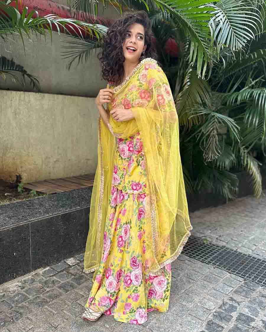 Mithila often lets her love for Indian outfits shine through. She donned a yellow and pink floral sharara for a sunny day out. 