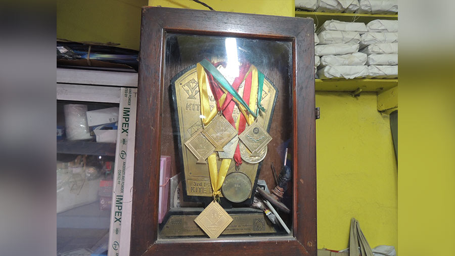 Some of the many medals that Ajit Dutta has won in his career as a kite-maker and enthusiast