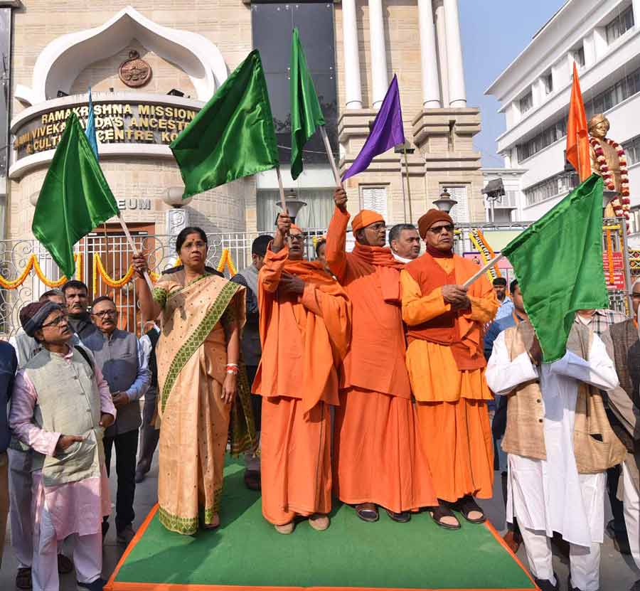 Minister Shashi Panja, along with monks, flags off a procession in front of Vivekananda’s ancestral home