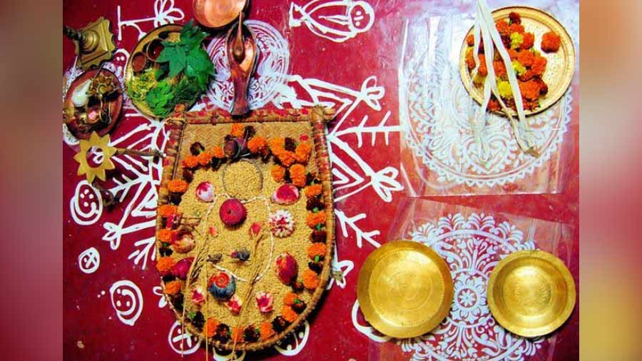 A payesh made with the newly harvested rice along with the grain itself is offered to god and kept in auspicious locations in the house, like the kitchen