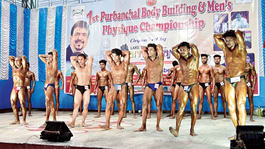 Contestants flaunt their physique at the event at Lake Town Block B Park on December 31. 