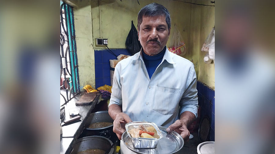 Aurobindo Patra with the canteen’s signature dish