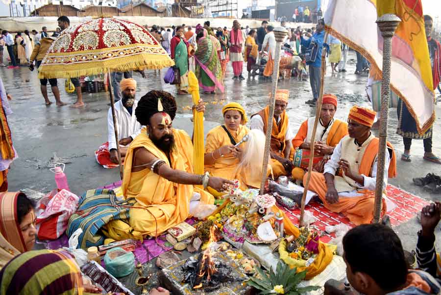 A puja in progress at Gangasagar Mela, 2023 on Saturday. On the occasion of Makar Sankranti, lakhs of pilgrims arrived at South 24 Parganas’ Sagar Island to take the holy dip