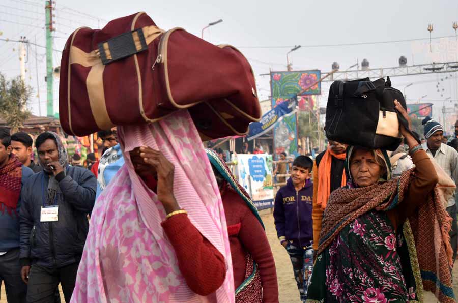 Devotees arrive at the festival