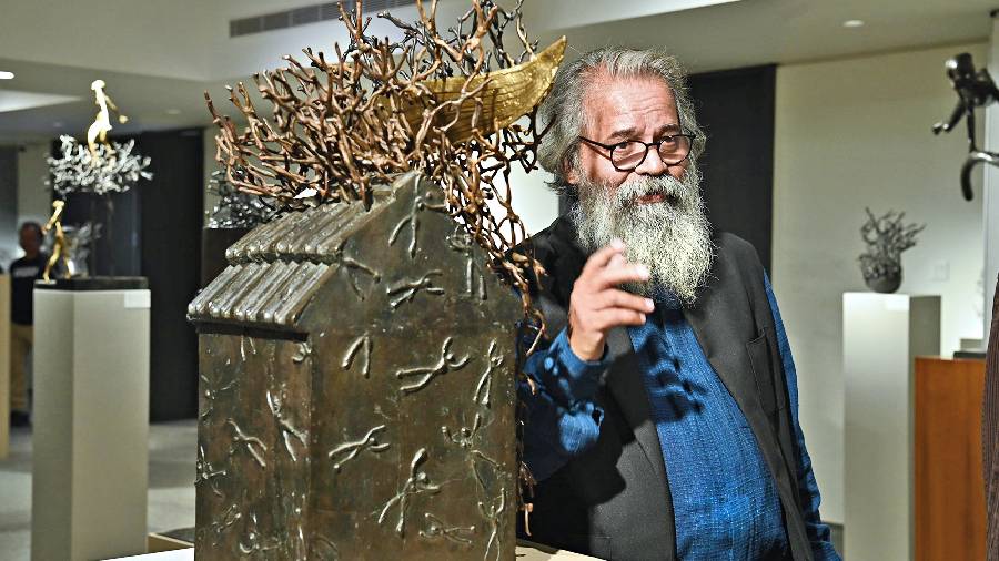 K.S. Radhakrishnan with one of his exhibits at Emami Art