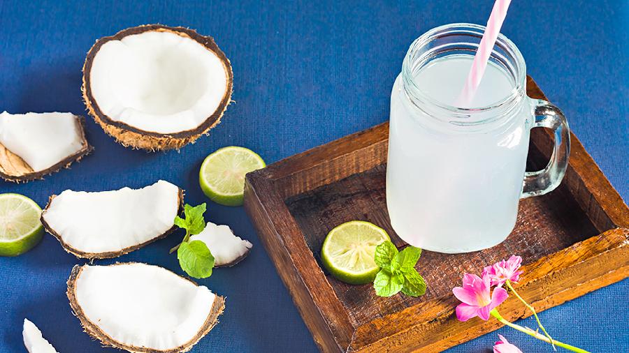 Fresh organic coconut water in a jar