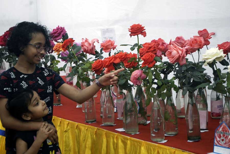 Young visitors check out roses on display at the 33rd Annual Rose Show jointly organised by Lions Club of Calcutta North and Bengal Rose Society at Lions Safari Park on January 15