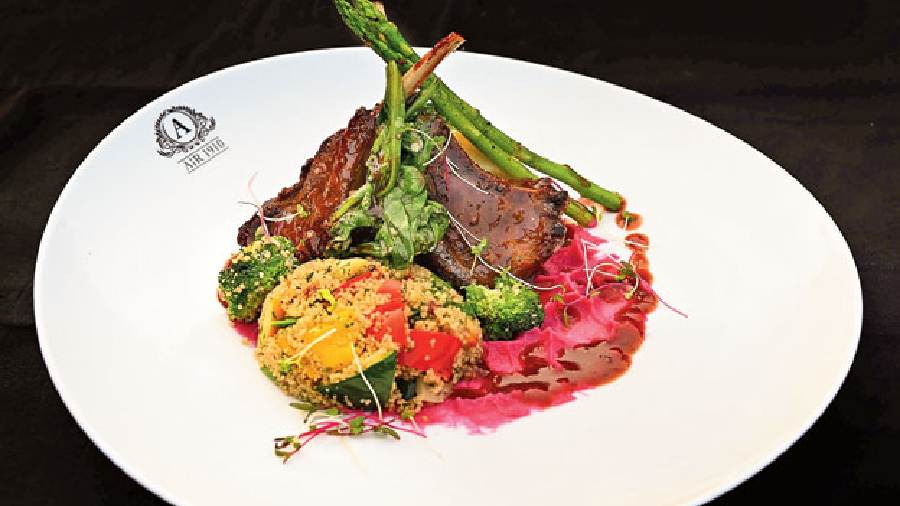 Moroccan Lamb Chops: New Zealand lamb chops are coated in Moroccan spices and grilled till tender. Cranberry wine jus, potato mash and roast veggies make for the ideal accompaniment to the dish.