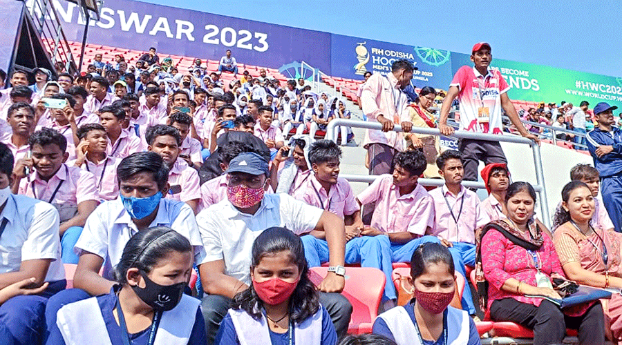 School students at Bhubaneswar’s Kalinga Stadium during the FIH World Cup.