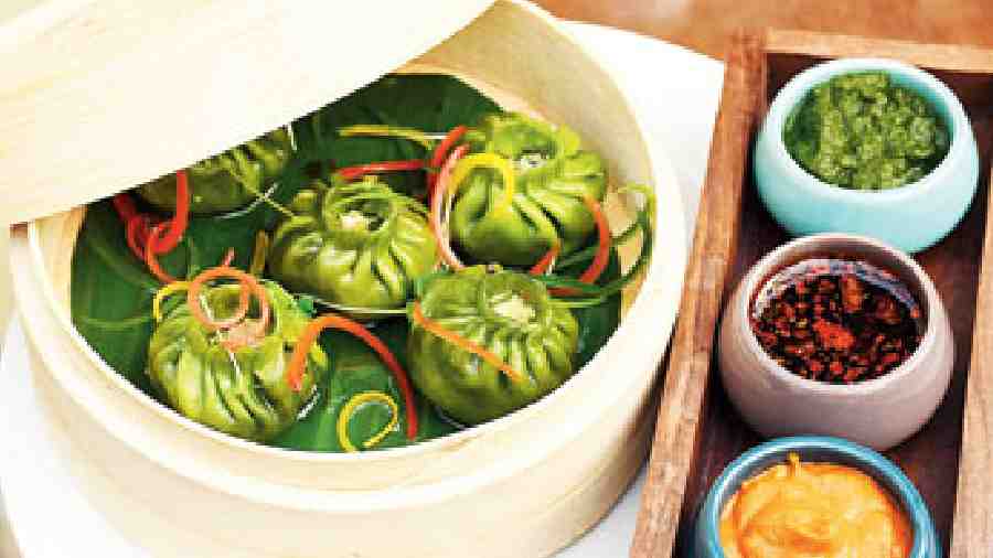 Broccoli Cashewnut Dumplings are green and soft with flavourful cashewnut filling, and are served with spicy mayo, chilli oil and mint and chilli chutney.